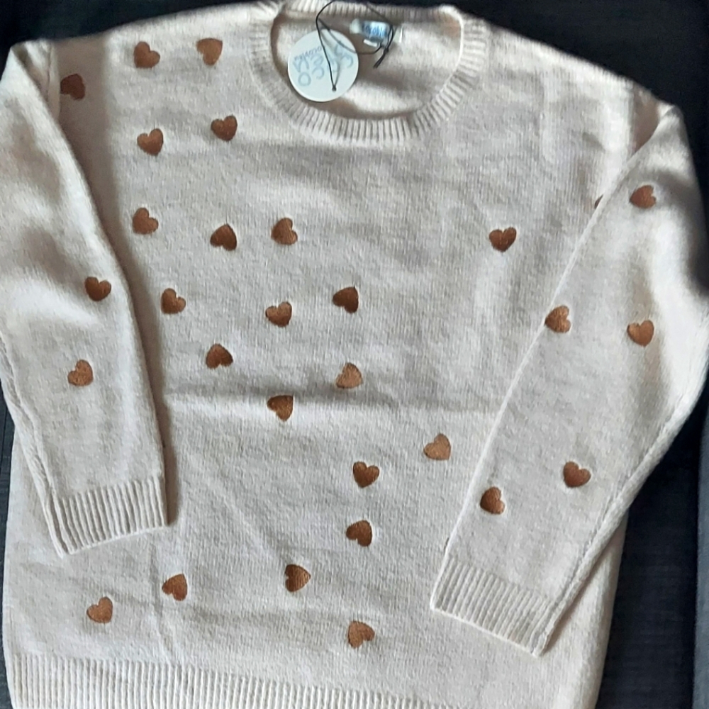 Cocobleu heart sweater.   I never wore this after purchase.